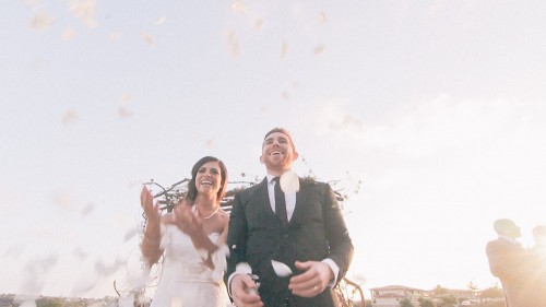 Bride, falling flowers