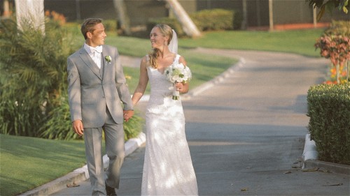 Bride and groom walking at Lomas Santa Fe Country Club