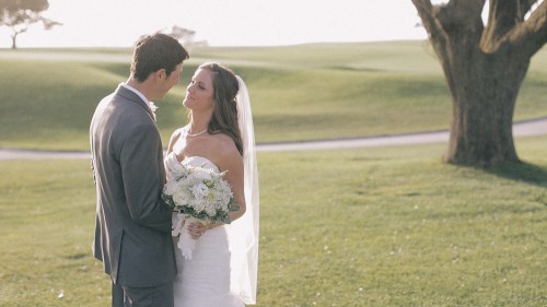 Bride and groom on golf course wedding