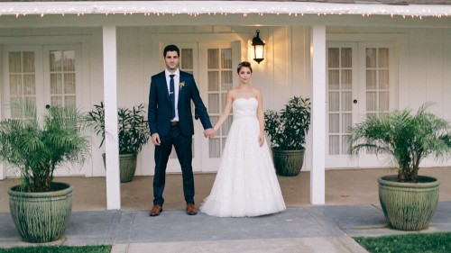 bride and groom standing apart