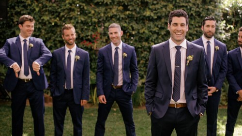 Groom and groomsmen having fun