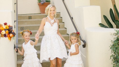 bride with flower girls