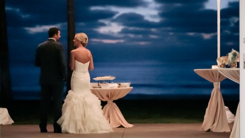 Bride and Groom gaze out to sea in wedding video