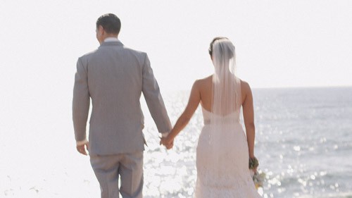 Bride and groom at beach