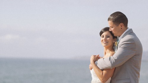 Bride and groom at beach La Jolla