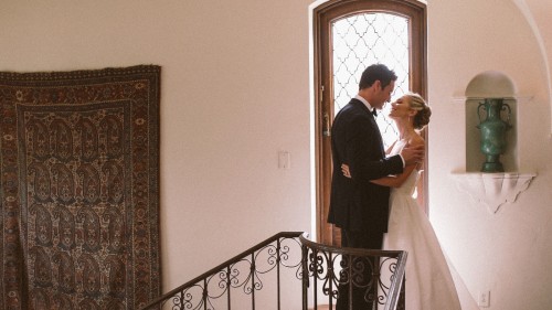 bride and groom on stairs at Darlington House