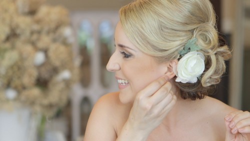 Bride puts on earings