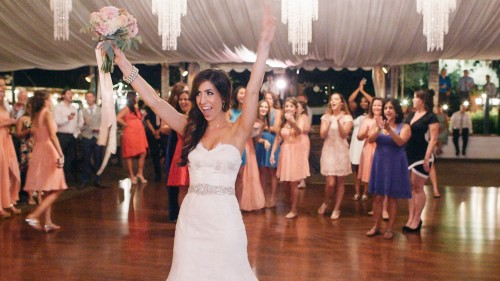 Bride throwing bouquet