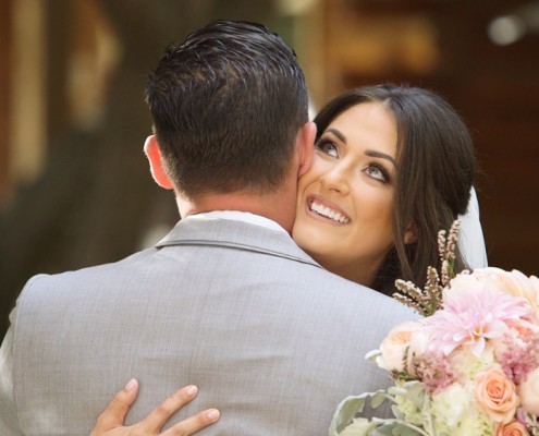 Bride and groom first look at Lake Oak Meadows Wedding in temecula wine country