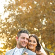 Bride and groom backlit at sunset at Lake Oak Meadows Wedding