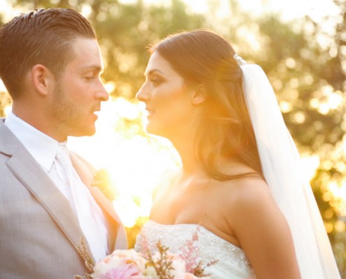 Bride and groom at sunset at Lake Oak Meadows Wedding