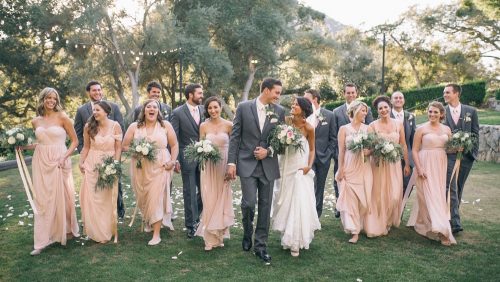 bridal party walking at Mt. Woodson Castle