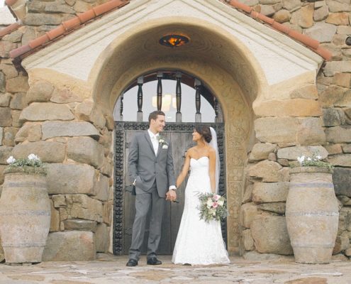 Bride and groom in front of Mt Woodson