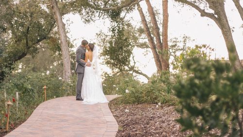 Bride and groom kiss