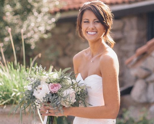 Bride with bouquet at Bride and groom ceremony Mt Woodson Castle