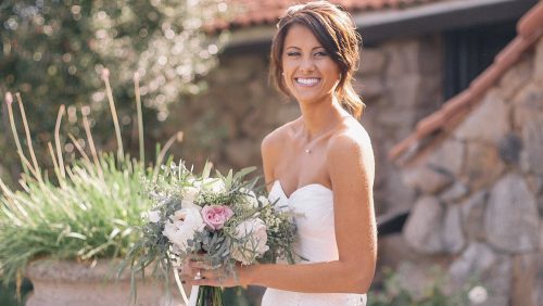 Bride with bouquet at Bride and groom ceremony Mt Woodson Castle