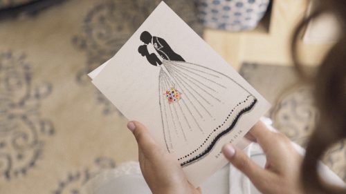 Bride reads card