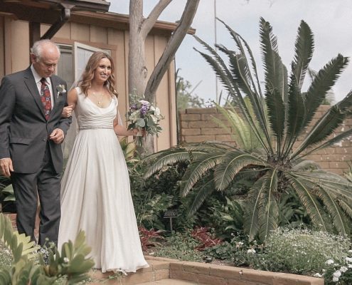 Bride walking down the aisle at San Diego Botanical Gardens wedding video.