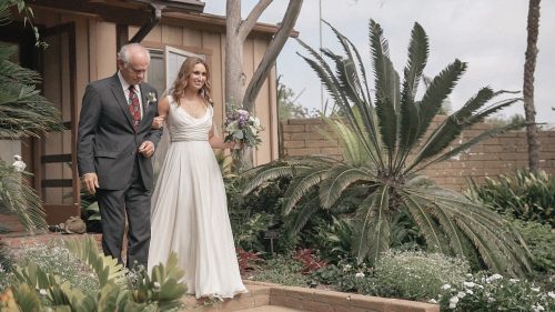 Bride walking down the aisle at San Diego Botanical Gardens wedding video.