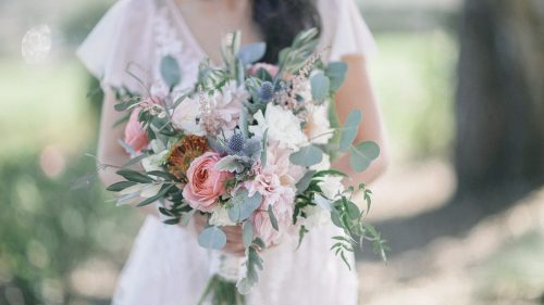 bride holding bouquet carsbad