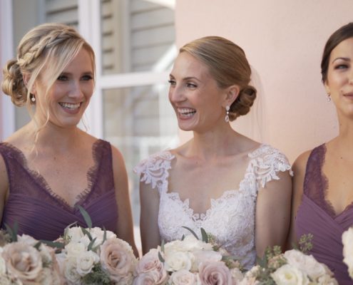 Bride with Bridesmaids at La Valencia wedding before ceremony.