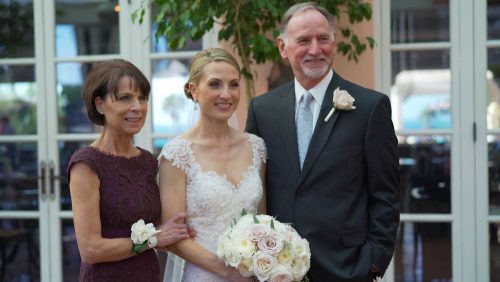 Parents with bride at wedding la jolla