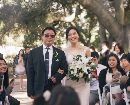 Bride walking down the aisle mt woodson castle