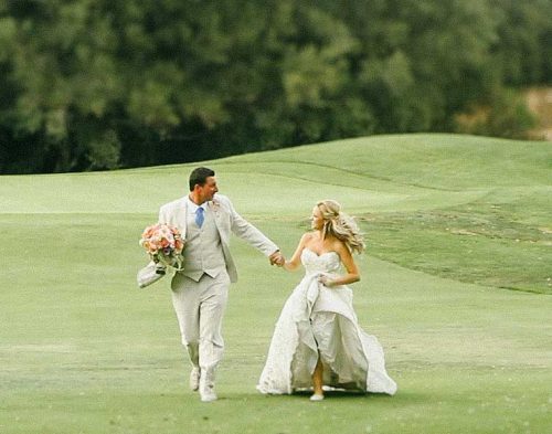 Temecula Creek Inn Wedding Bride and groom runnning