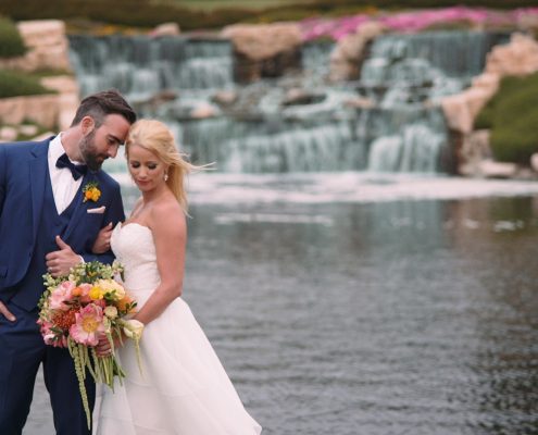 Crossings at Carlsbad wedding groom holds bride