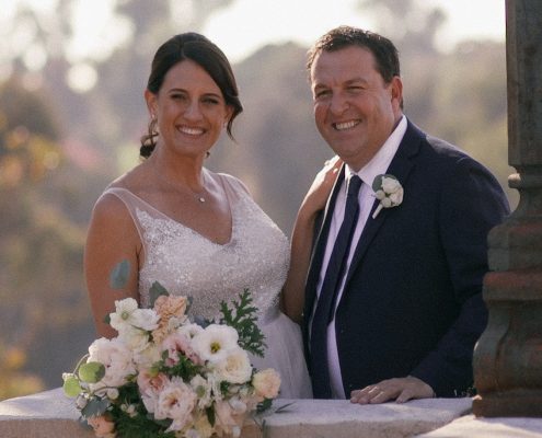 Bride and groom on the bride at balboa park in San Diego wedding video
