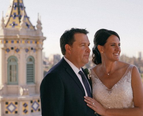 bride and groom at the top of the tower of the Museum of Man in Balboa Park San Diego