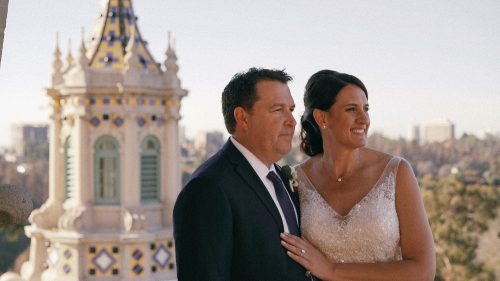 bride and groom at the top of the tower of the Museum of Man in Balboa Park San Diego