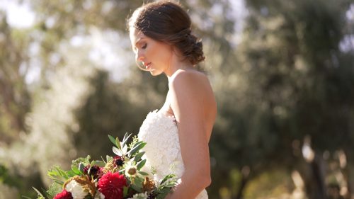 Bride and groom walking at Lake Oak Meadows in Temecula.