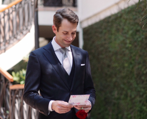 Groom get emotional while reading heartfelt card from bride