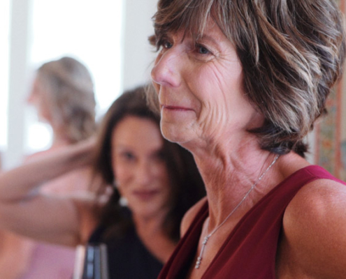 Mother of the bride cries tears of joy as bride gets ready