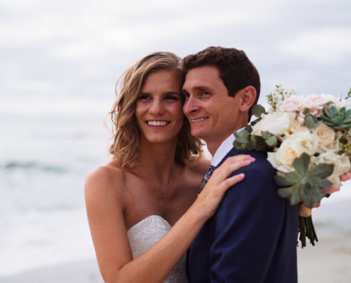 Bride and groom together on beach in La Jolla Cove Wedding Video