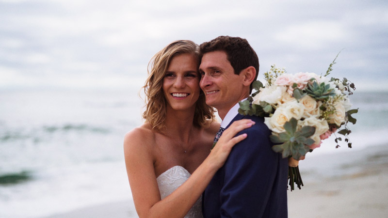 Bride and groom together on beach in La Jolla Cove Wedding Video
