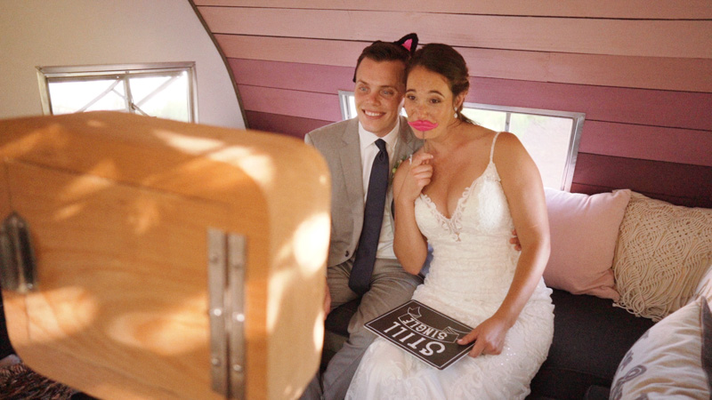 Bride and groom in photobooth