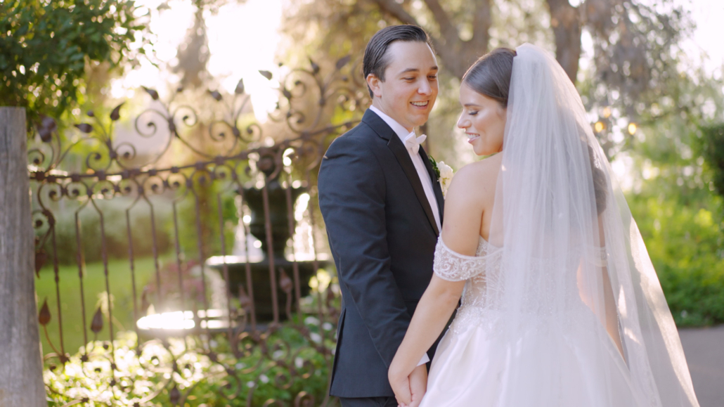 Ethereal Gardens Wedding Bride and Groom near gate