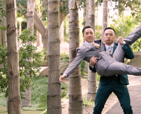 Fun groomsmen photos at wedding at Botanica