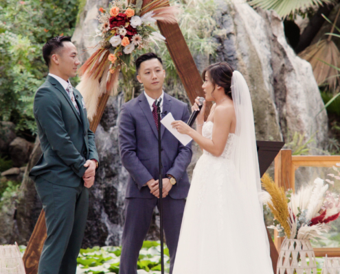 Bride and groom during wedding ceremony at Botanica